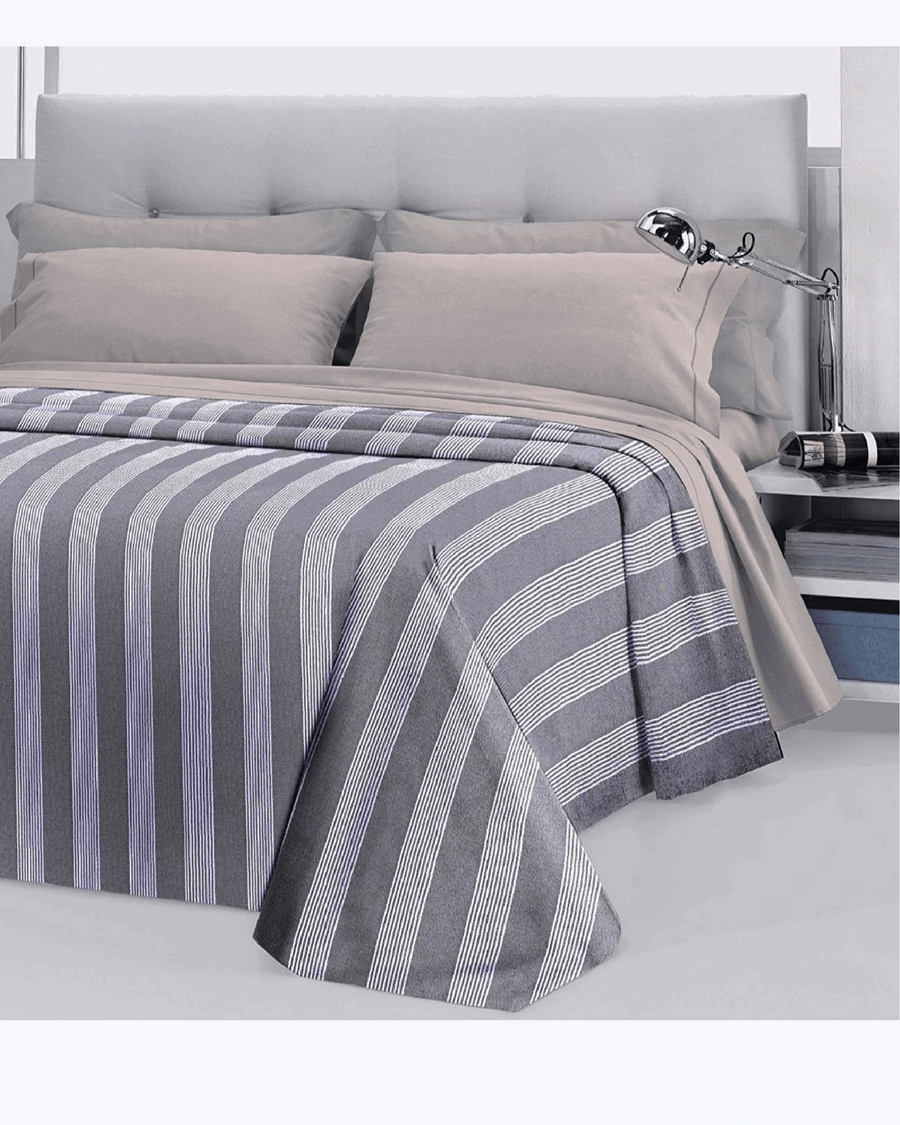 Copriletto leggero cinigliato a righe in misto cotone Blu